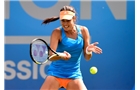 BIRMINGHAM, ENGLAND - JUNE 10:  Ana Ivanovic of Serbia in action during her first round match against Mona Barthel of Germany on day two of the Aegon Classic at Edgbaston Priory Club on June 10, 2014 in Birmingham, England.  (Photo by Tom Dulat/Getty Images)